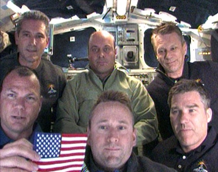 Image above: The STS-132 crew members share their thoughts on the possible final flight of space shuttle Atlantis during a commemorative message. Credit: NASA TV 