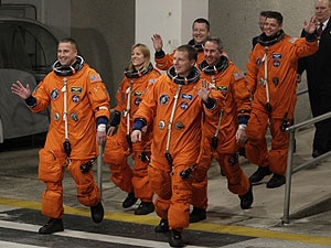 The astronauts of space shuttle Endeavour, clockwise from front left, commander George Zamka, mission specialist's Kay Hire, Nicholas Patrick, Bob Behnken, Steve Robinson and pilot Terry Virts, leave the Operations and Checkout Building to be transported to launch pad 39a at Kennedy Space Center in Cape Canaveral, Fla., Monday, Feb. 8, 2010. Endeavour, is scheduled for a 13 day mission to the International Space Station.(AP Photo/John Raoux)