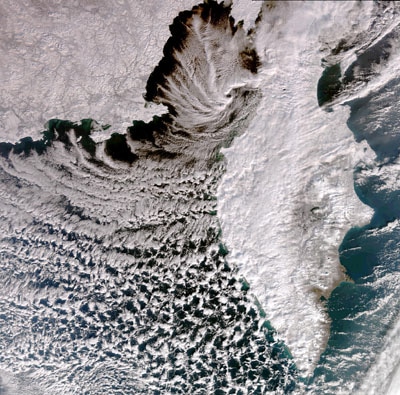 This image, acquired by Envisat's Medium Resolution Imaging Spectrometer (MERIS) instrument on 12 November 2009, captures the rugged and remote Kamchatka Peninsula on Russia's East Coast. The 1250-km long peninsula lies between the Pacific Ocean to the east and the Sea of Okhotsk to the west.  - Credit : ESA